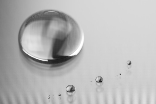 Clean and transparent drop on a smooth surface selective focus