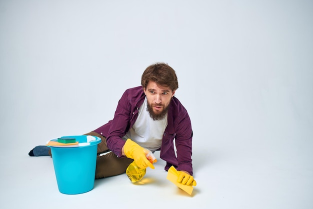 Cleaner on the floor with a blue bucket homework lifestyle professional High quality photo