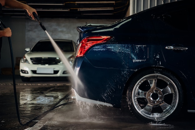 cleaning the car (car detailing) at car care shop