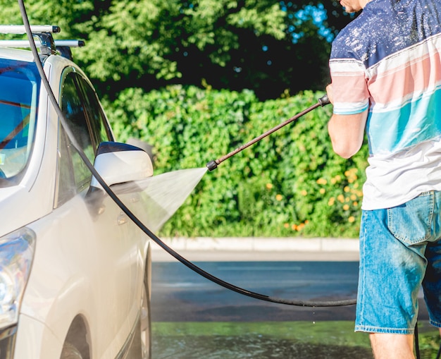 Cleaning car at self car wash