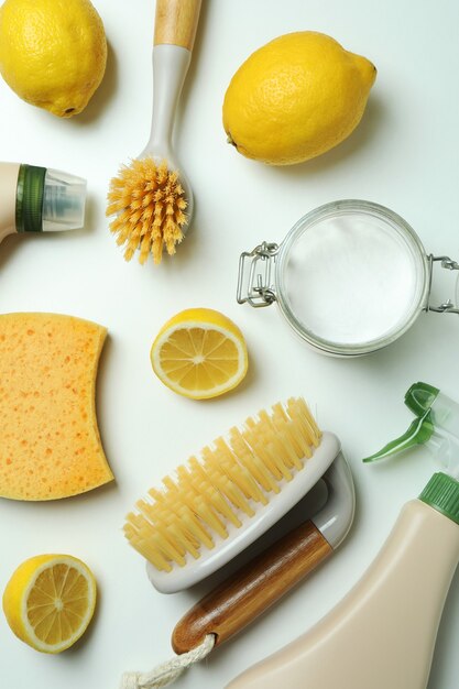 cleaning concept with eco friendly cleaning tools on white isolated background