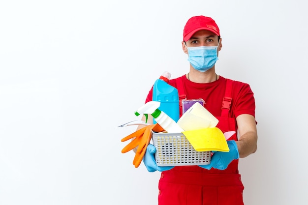 Cleaning and Disinfection at town complex amid the coronavirus epidemic. Professional teams for disinfection efforts. Infection prevention and control of epidemic. Protective gloves and mask