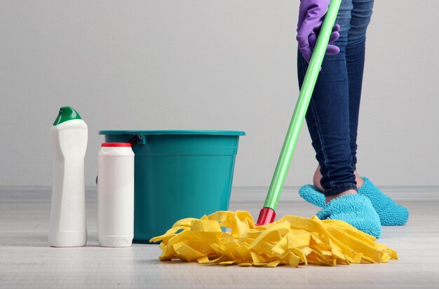 Cleaning floor in room closeup