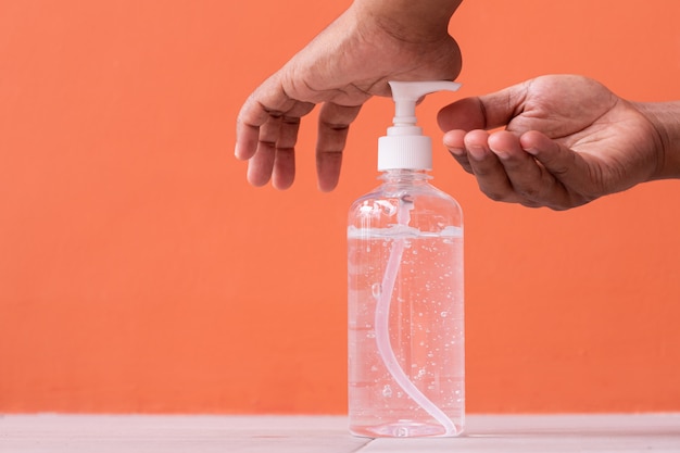 cleaning hands with alcohol gel.