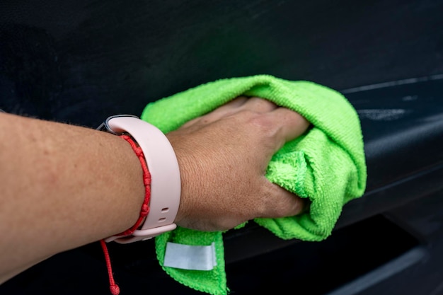 Cleaning the interior of a car with a cloth