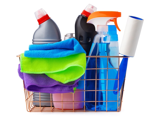 Basket with cleaning products on white background. Cleaning with