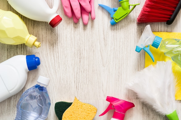 Cleaning items on white wooden table, Top view