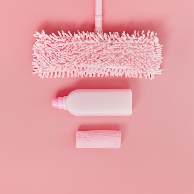 Cleaning kit in the house pink on a pink background.