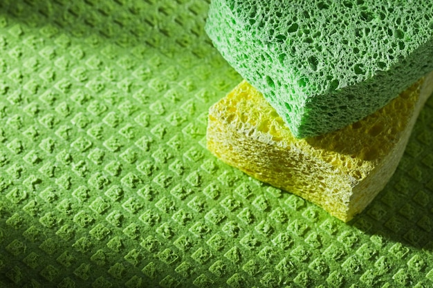 Cleaning kitchen sponges on washcloth