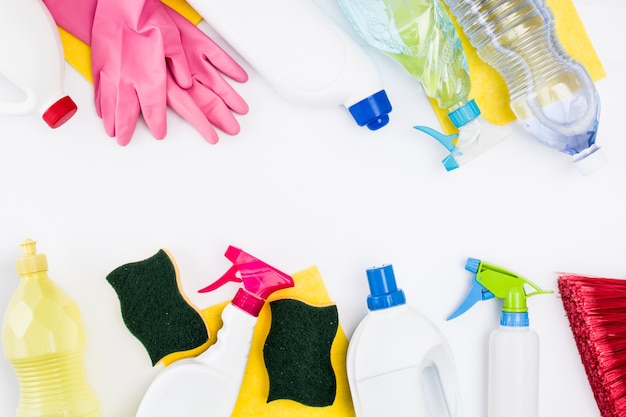 Cleaning products isolated on white  copy space