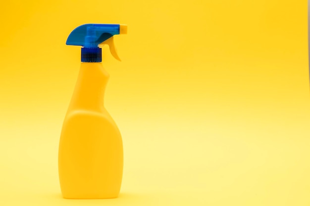 Photo cleaning spray bottle products on a bright yellow background