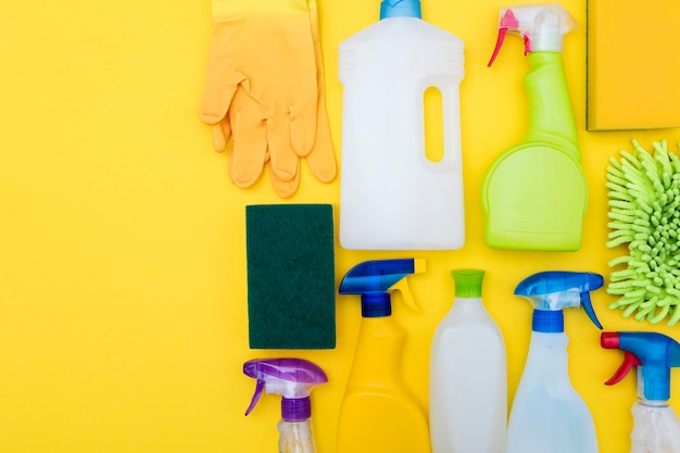 Cleaning spray bottles and cloth lay flat composition