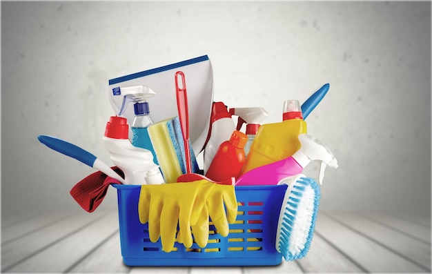 Photo cleaning supplies in basket isolated on  background