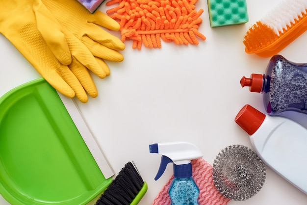 Cleaning tools circle from spray bottle and other items isolated