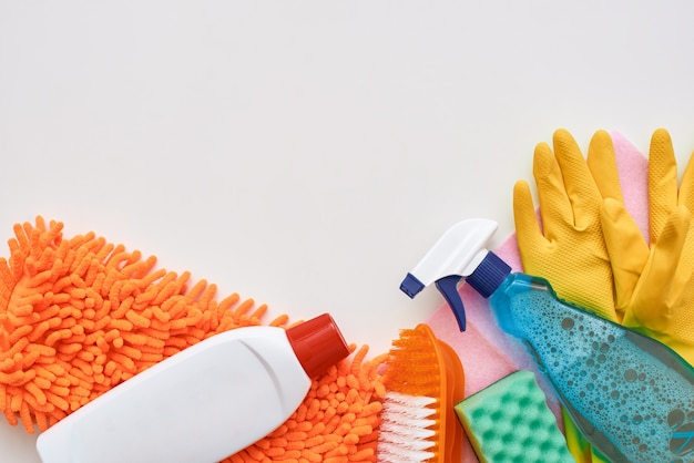 Cleaning tools. Spray bottle and other items isolated at the bottom of the picture