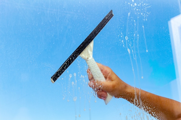 Cleaning window with special brush