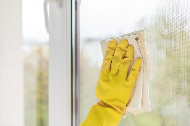 Cleaning windows with special rag