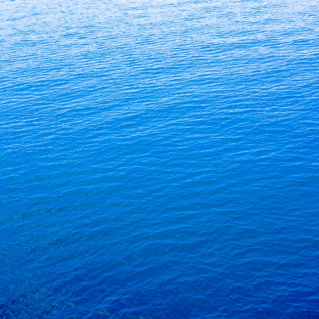 Photo clear blue sea with space for text