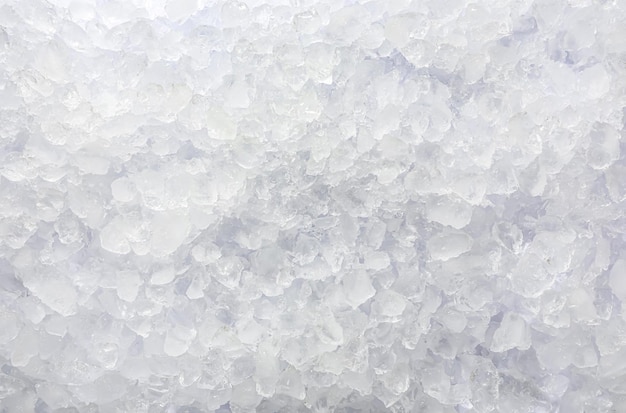 Clear crushed ice as background top view