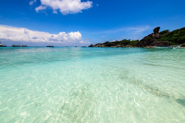 Clear sea with white cloudy and blue sky at similan island phang-nga thailand