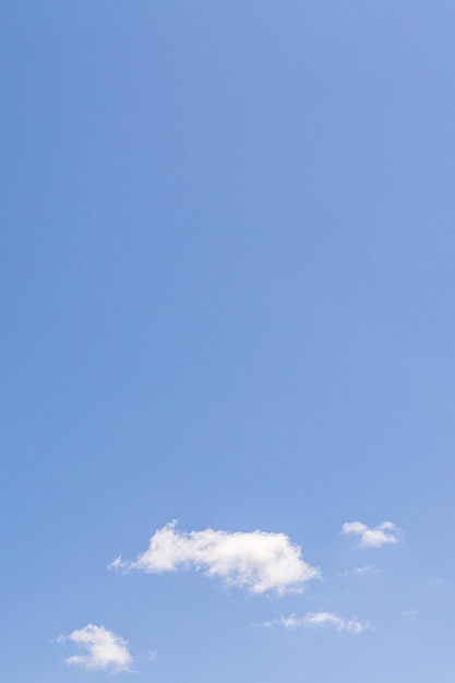 Clear sky blank with small white clouds