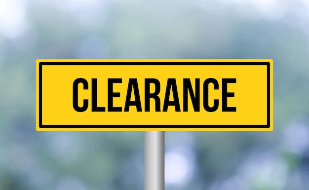 Clearance road sign on blur background