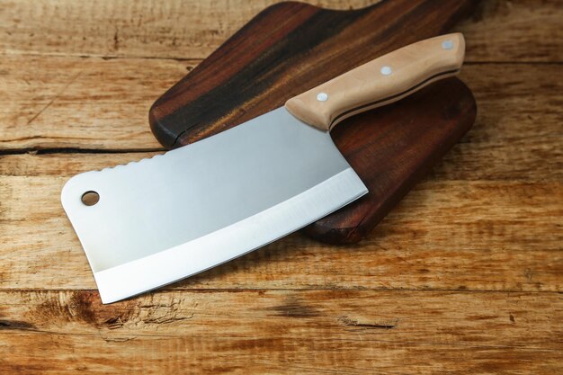 Photo cleaver knife on wooden board