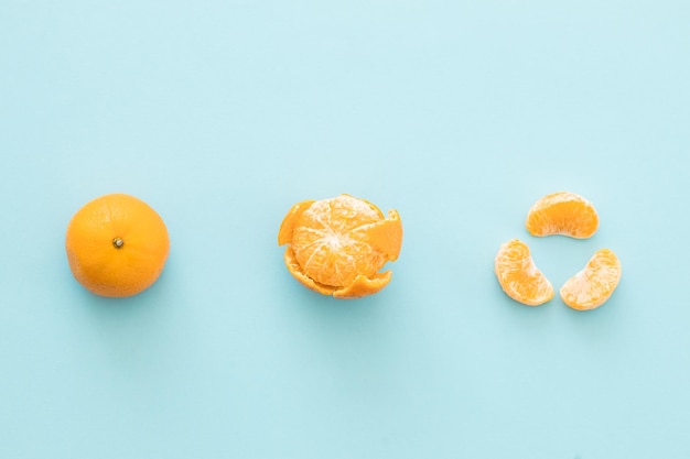 Clementine mandarin on a blue background