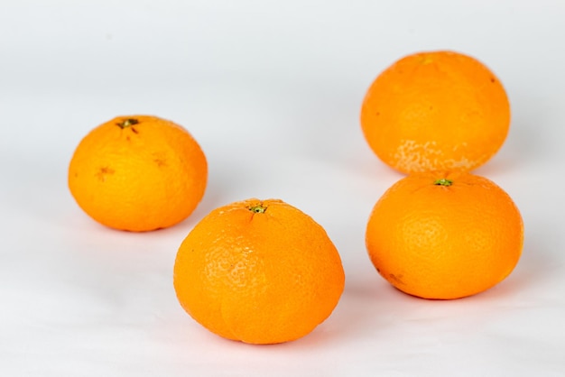 Clementine or tangerine on white background