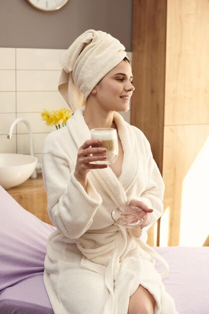 Client drinking coffee in the spa