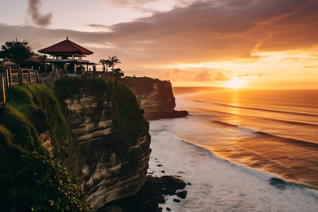 a cliff with a beach and a house on it