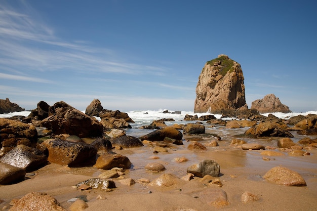 Cliffs and rocks on the atlantic ocean coast - praia da ursa beach, portugal.