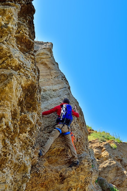 Climber climbing up