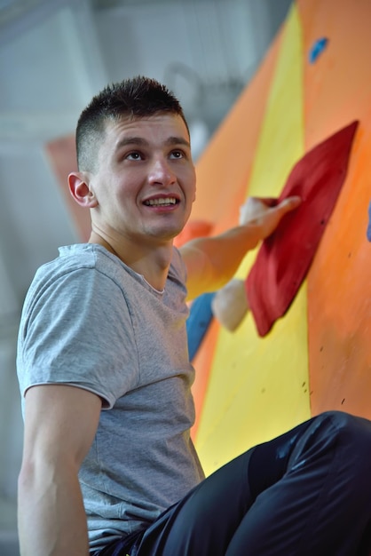 Climber Man On Artificial Climbing Wall