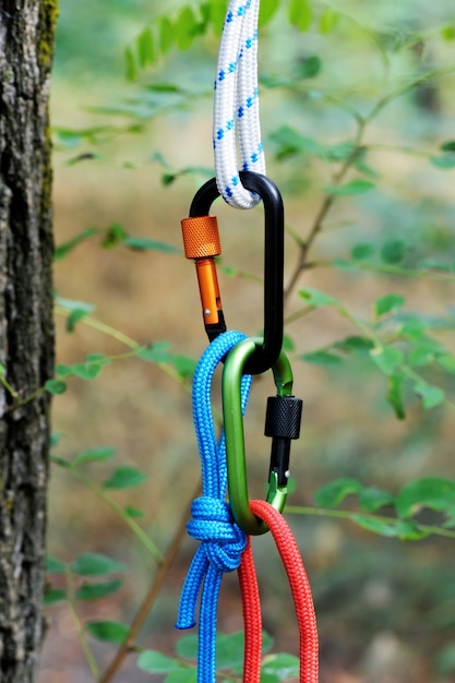 Climbing sports image of a carabiner on a rope