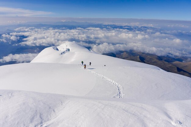 Climbing team on a snowy ridge