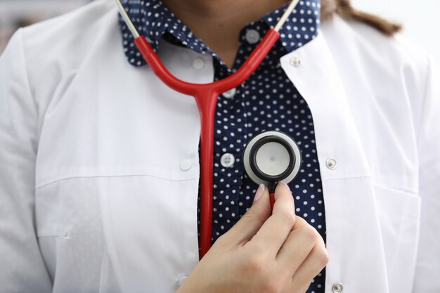 Clinical worker listen chest with stethoscope