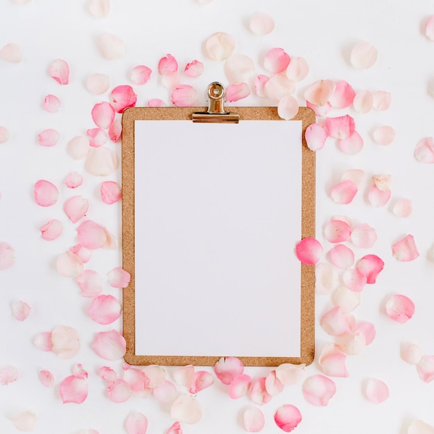 Clipboard design and pink rose petals pattern