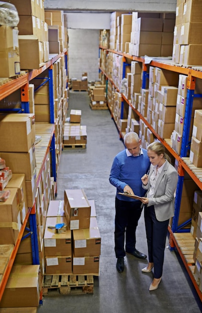 Photo clipboard logistics and business people at warehouse with top view planning teamwork or delivery checklist retail sales or factory team brainstorming compliance documents or storage solution