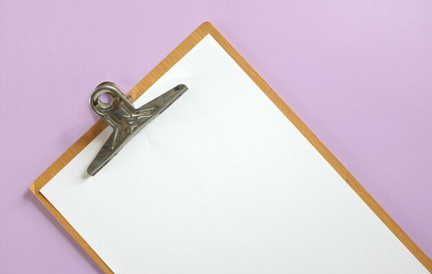 Photo clipboard on pastel purple background