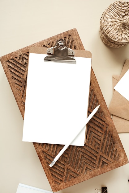 Photo clipboard tablet pad with blank paper sheet. artist home office workspace