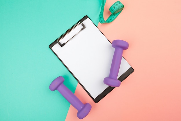 Photo clipboard with gym equipment