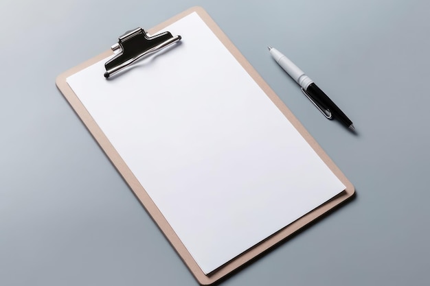 A clipboard with a white sheet of paper next to it