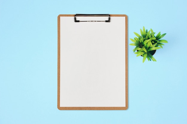 Clipboard with white sheet on pastel color background, Minimal concept