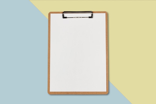 Clipboard with white sheet on pastel color background, Minimal concept