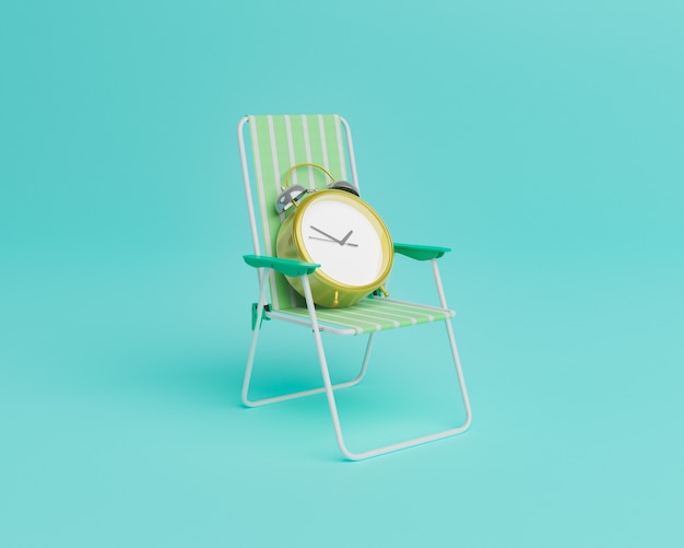 时钟在沙滩上的椅子照片