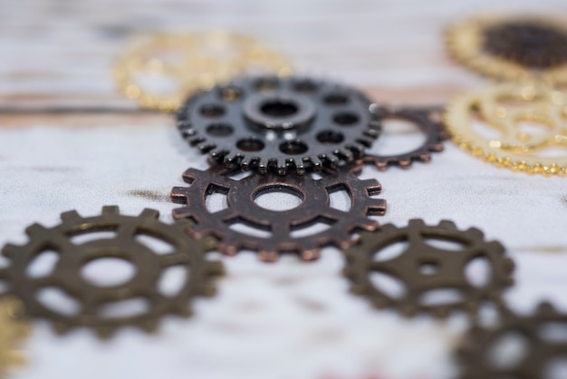 Photo clock gear wheels on white table