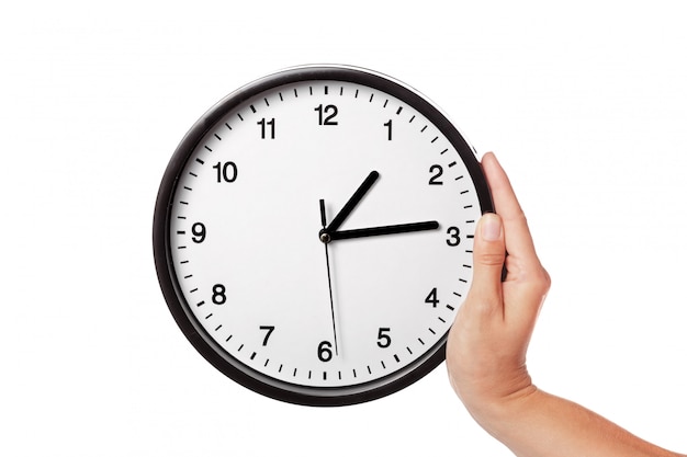 clock in hands isolated on white