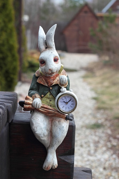 Photo clock hare with umbrella