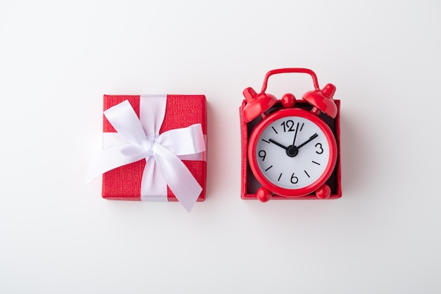 Clock in red gift box time concept